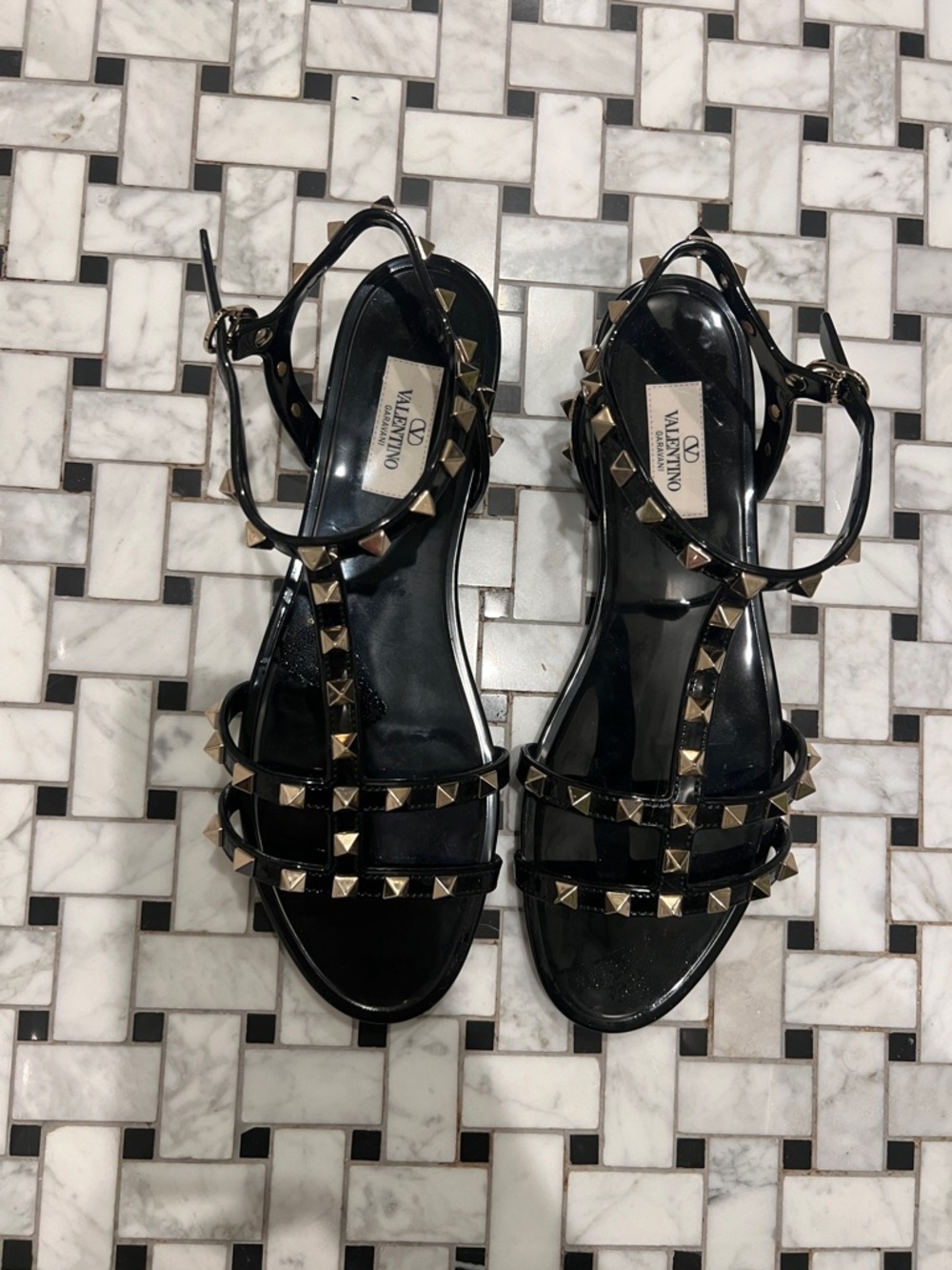 Valentino Garavani Black Sandals with Gold Rockstuds
